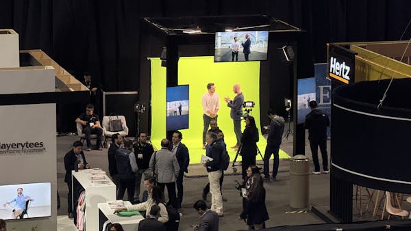 Studio setup with green screen and professional lighting